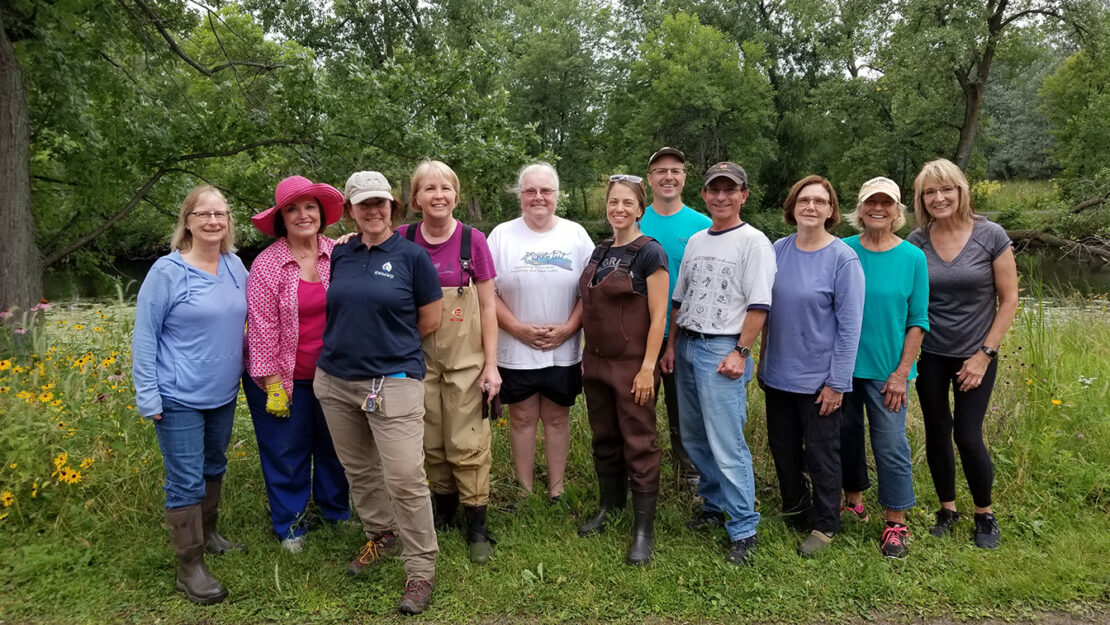 Group photo of CAC and LEAP Team members who planted along Keller Creek